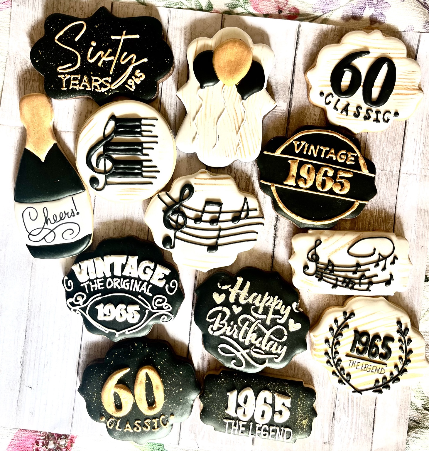 Black, white, and gold vintage 60th birthday cookies